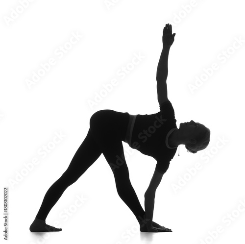 Silhouette of young woman p...