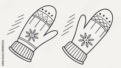 Two mittens with flower and geometric patterns for winter warmth and cozy style on a white background