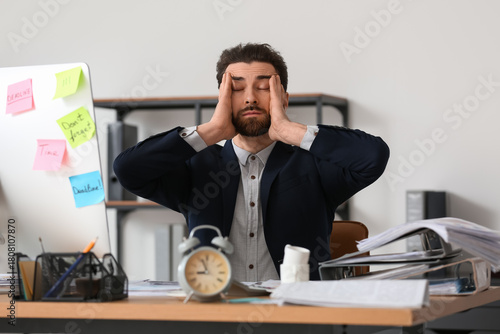 Stressed businessman with a...