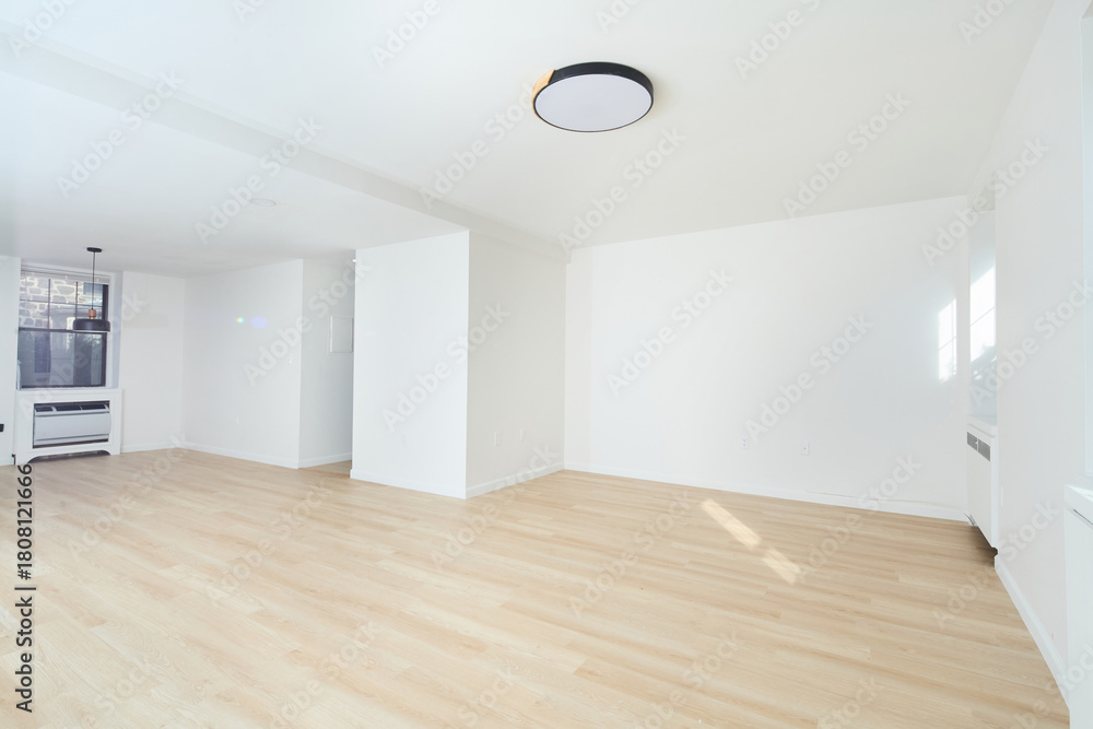 Obraz premium Bright empty white room with natural wood floors
