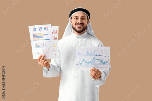 Arab businessman with diagr...