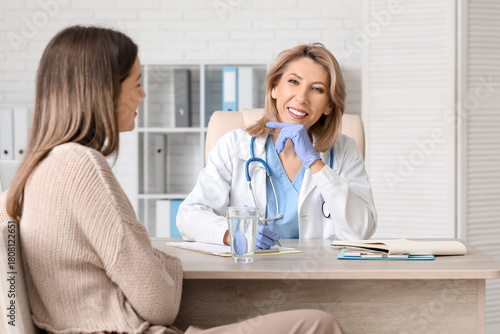 Female doctor working with ...