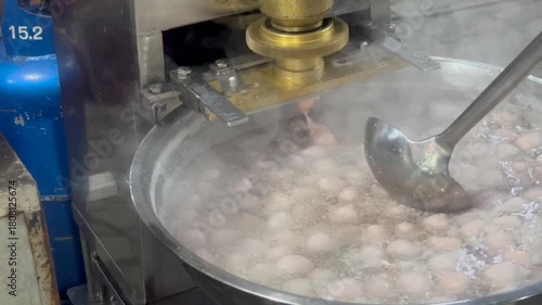 the machine is making meatballs