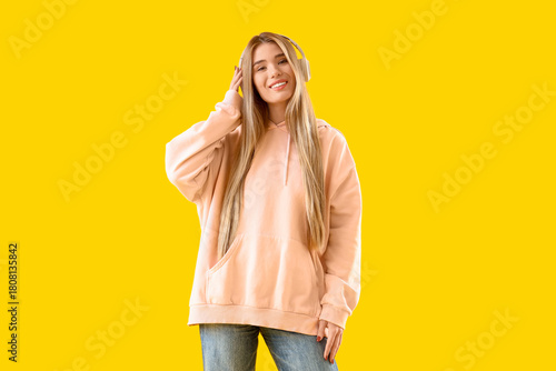 Stylish young woman in pink...