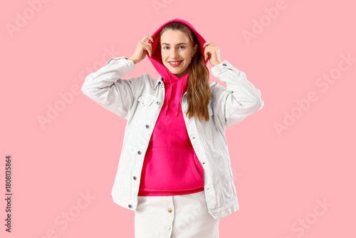 Stylish young woman in hood...