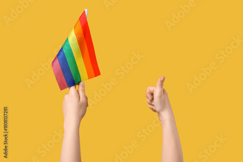 Female hands with LGBT flag...