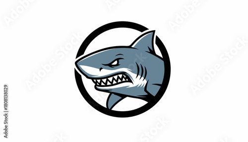 A fierce cartoon shark with sharp teeth and an aggressive expression, depicted within a black circle.