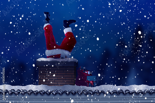 фотографія Santa Claus crawling into chimney under falling snow at night