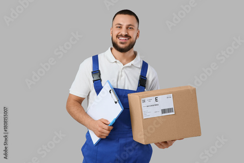 Delivery man with parcel an...
