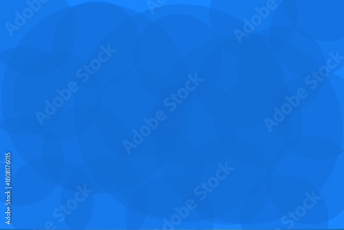 A vibrant and clean abstract vector background composed entirely of various sizes of overlapping, translucent blue circles or spheres