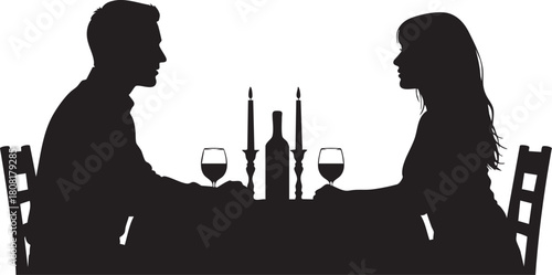 Silhouette of a couple having dinner