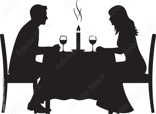 Silhouette of a couple having a romantic dinner with candle