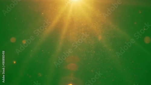 Ethereal golden light rays and lens flare illuminate floating particles against a vibrant green backdrop.