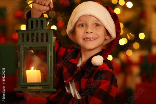Little happy boy in checker...