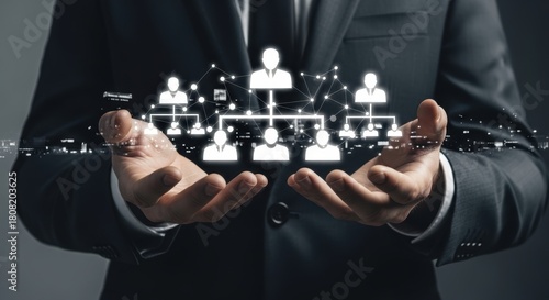 Businessman holding an organization chart representing corporate hierarchy and company structure showcasing teamwork and leadership