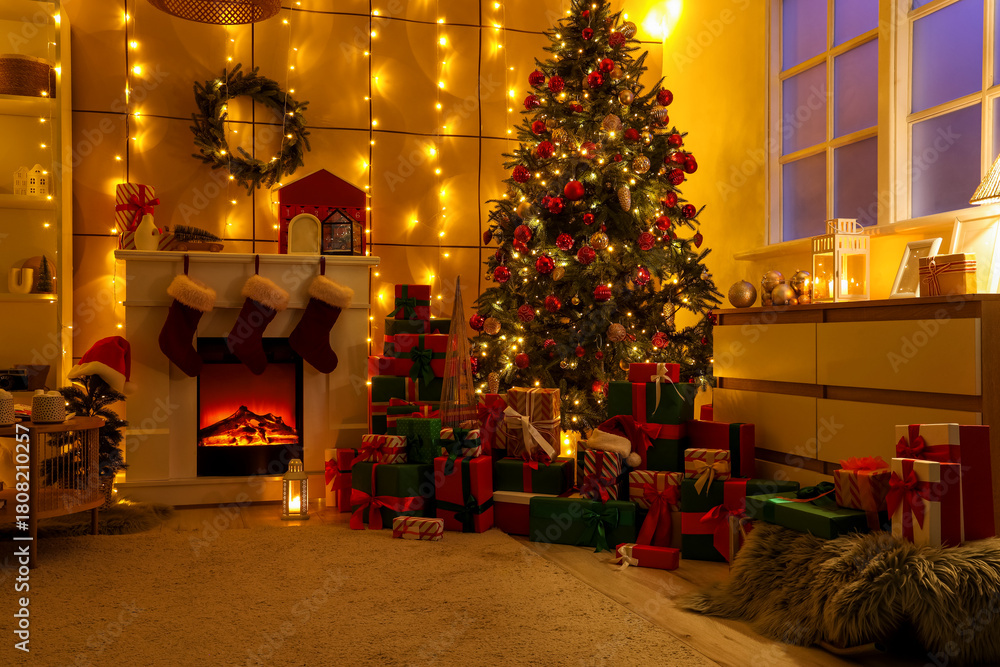 Fototapeta premium Interior of living room with glowing Christmas tree, presents and fireplace at night