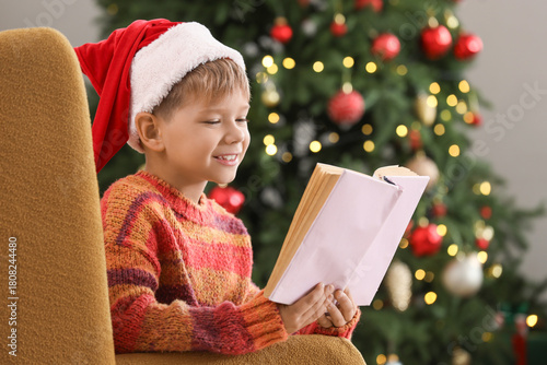 Cute little boy with Santa ...