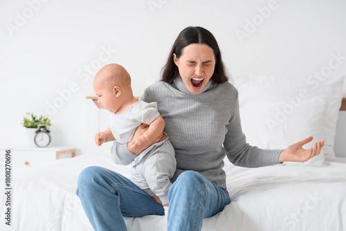 Screaming young woman with ...
