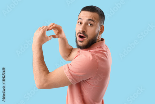 Surprised young man looking...
