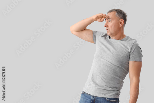 Shocked mature man looking ...
