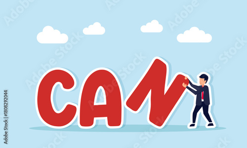 Businessman arranging the letter N to complete the word CAN illustrating a businessmans optimism in running a business project