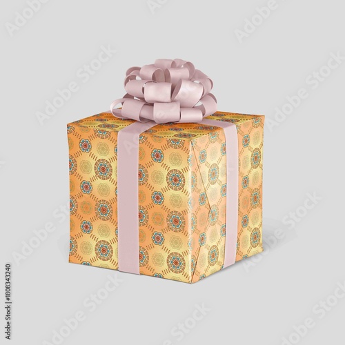 Golden Gift Box with Ornamental Circular Motifs and Pink Ribbon Bow