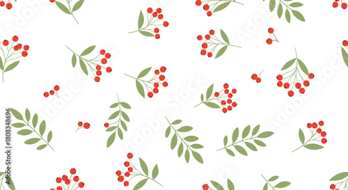 Elegant botanical seamless pattern featuring scattered red berries and green leaves, ideal for festive and natural designs.