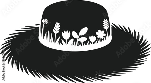 Black silhouette Easter bonnet with white floral and grass design
