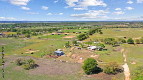 Tableau sur toile Aerial Ranch Overview with Pastures, Outbuildings and Country Home