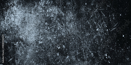 Dark grunge texture background with heavy diagonal scratches and distressed worn surface black and white vintage overlay.