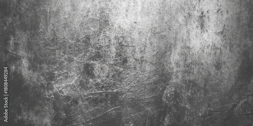 Old dark gray grunge texture background with heavy scratches dirt dust and distressed surface effect vintage industrial or film overlay.