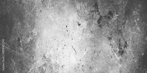 Dark grunge texture background distressed aged cracked concrete or stone wall surface with scratches and splatters monochrome design element.
