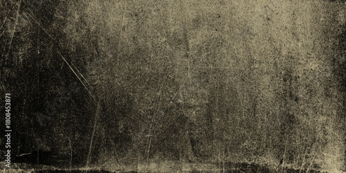 Abstract dark grunge texture with black and gray concrete wall and vignette effect details including scratches, cracks, peeling paint effects, dust particles.