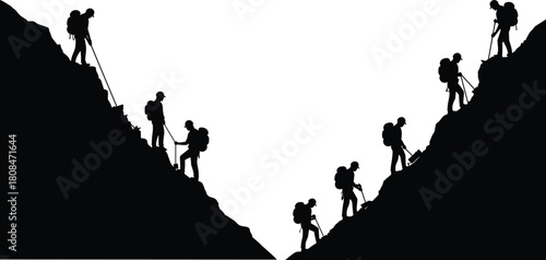 Group of hikers climbing and descending steep mountain slopes with backpacks and ropes during outdoor adventure and extreme expedition