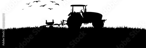 Tractor on a field silhouette