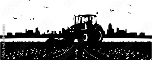 Tractor on a field silhouette