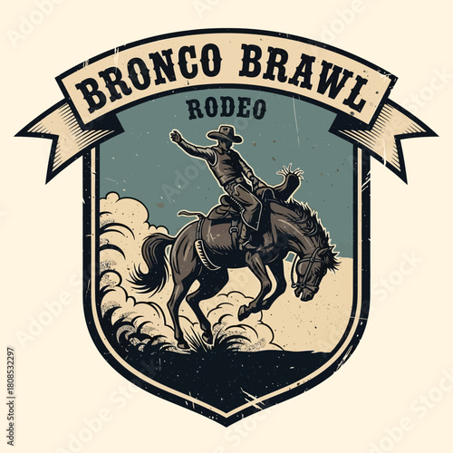 Bronco Brawl Rodeo - A cowboy rides a bucking bronco in a rodeo event.