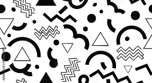 Abstract black and white geometric shapes create a repeating pattern on a white background.