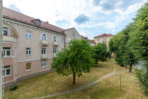 Wallpaper Mural Courtyard View with Green Trees and Historic Buildings Torontodigital.ca