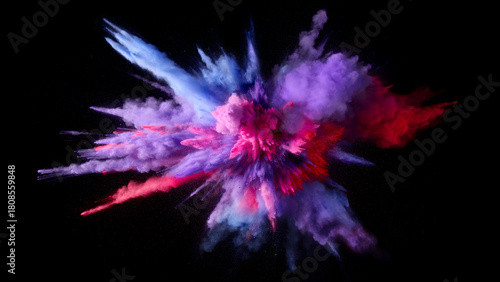 Colorful powder explosion with pink purple and red hues against black