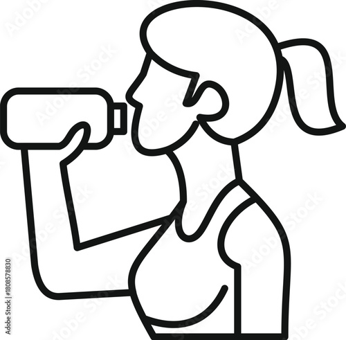 Female athlete drinking water to stay hydrated after exercising