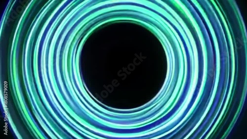 Hypnotic tunnel of blue and green rings — futuristic visualization for meditation and tech mood