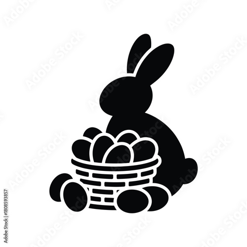 Black silhouette of easter bunny with basket of eggs
