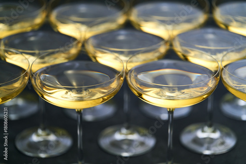 champagne wine in a coupe glasses ready to drink, close up.