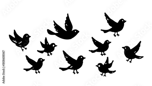 Collection of Black Bird Silhouettes in Various Poses on a White Background Ideal for Nature Wildlife and Artistic Design Projects