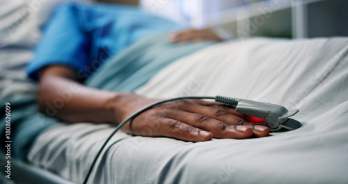 Obraz na płótnie Hands, ill patient and oximeter in hospital bed for blood levels, monitor pulse and recovery