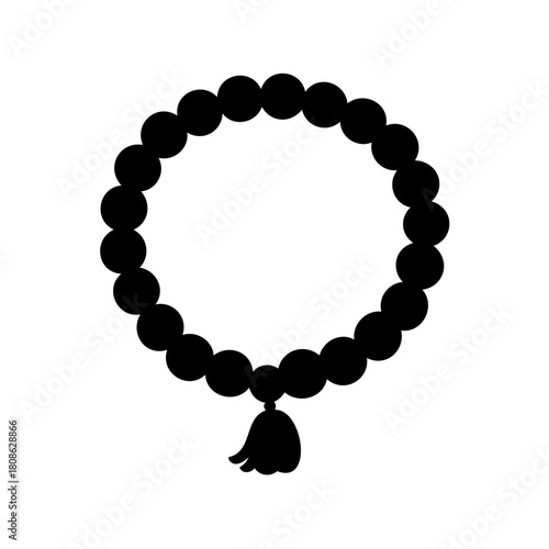 Silhouette image of a beaded mala bracelet with a tassel pendant