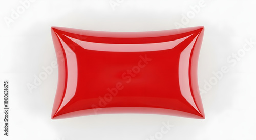 Modern red pillow with a sleek, glossy shine perfect for interior design mockups or ads