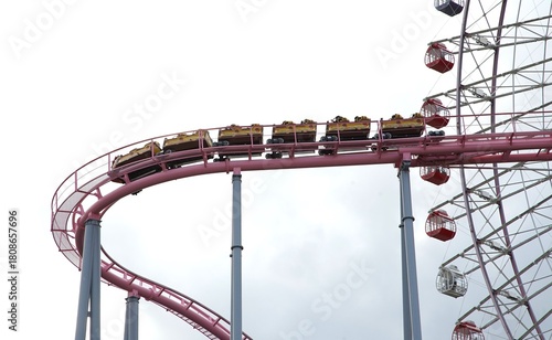 Roller Coaster Curve Near a Ferris Wheel	