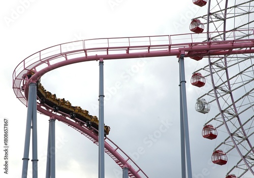 Roller Coaster Curve Near a Ferris Wheel